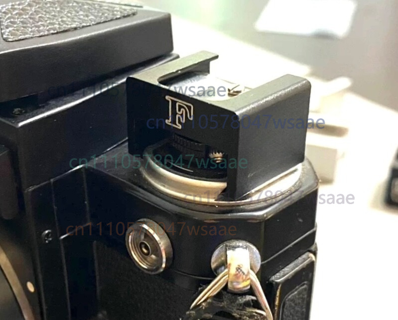 قطعة واحدة من محول فلاش كلاسيك - مراجعة Hot Shoe Adapter وسعره